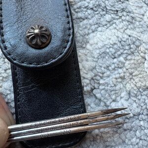 Chrome Hearts leather toothpick case with 3 sterling silver toothpicks.